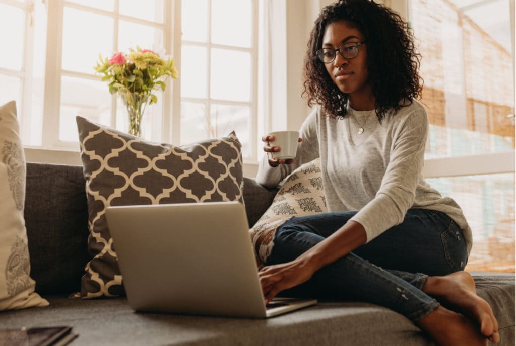 Woman business owner working from home on the computer Woman business owner working from home on the computer